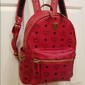 black and red mcm backpack